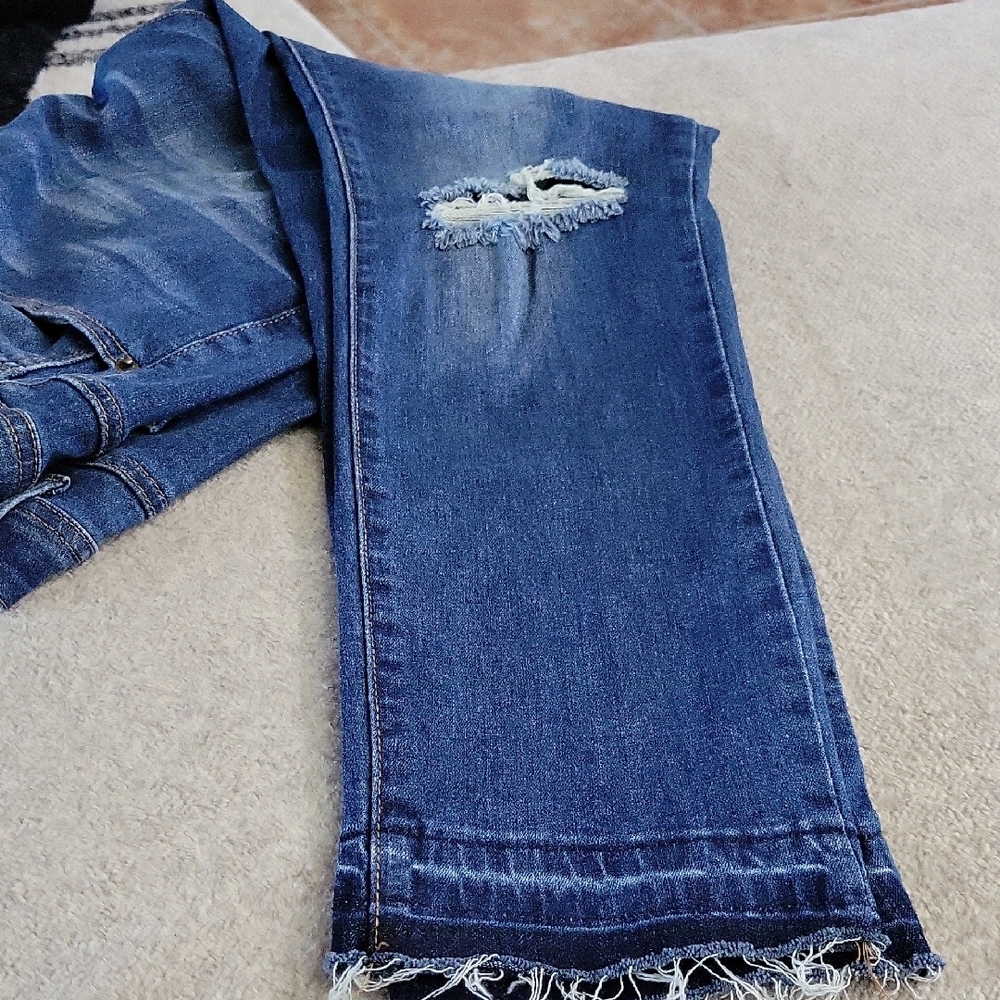 Distressed Blue Jeans